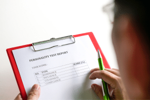 test taker with red clipboard to learn about nervous system at works