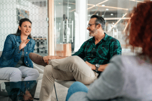 men and women having a conversation about what teams look like when they stop losing their temper at work
